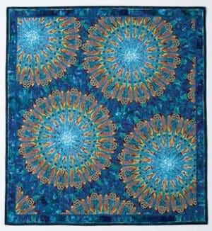 Paula Nadelstern, Kaleidoscopic XVII: Caribbean Blues, 1997, machine-pieced and hand-quilted cotton and silk, 71 x 66 in., Collection of the artist / Photo by Luke Mulks and Diane Pedersen