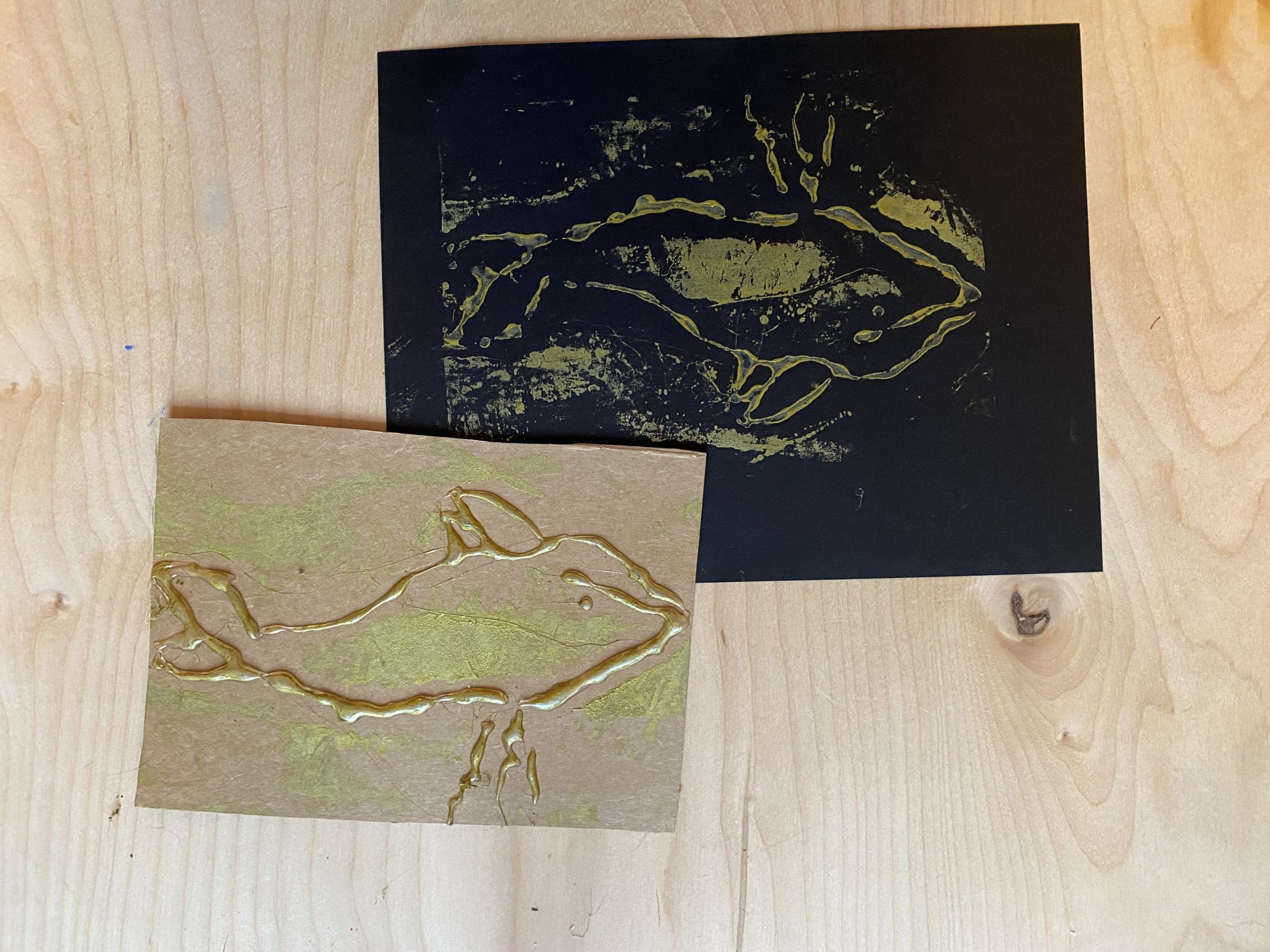 relief print of whale from hot glue and plate