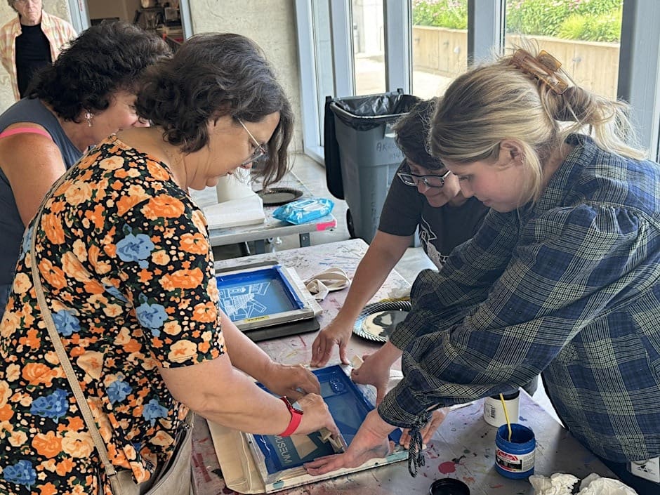 Staff and members creating a screen print at the Akron Art Museum