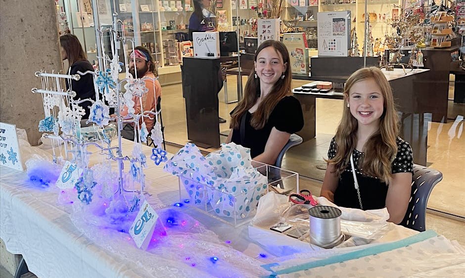 Children selling hand-made gifts at Kids Maker Fest at the Akron Art Museum